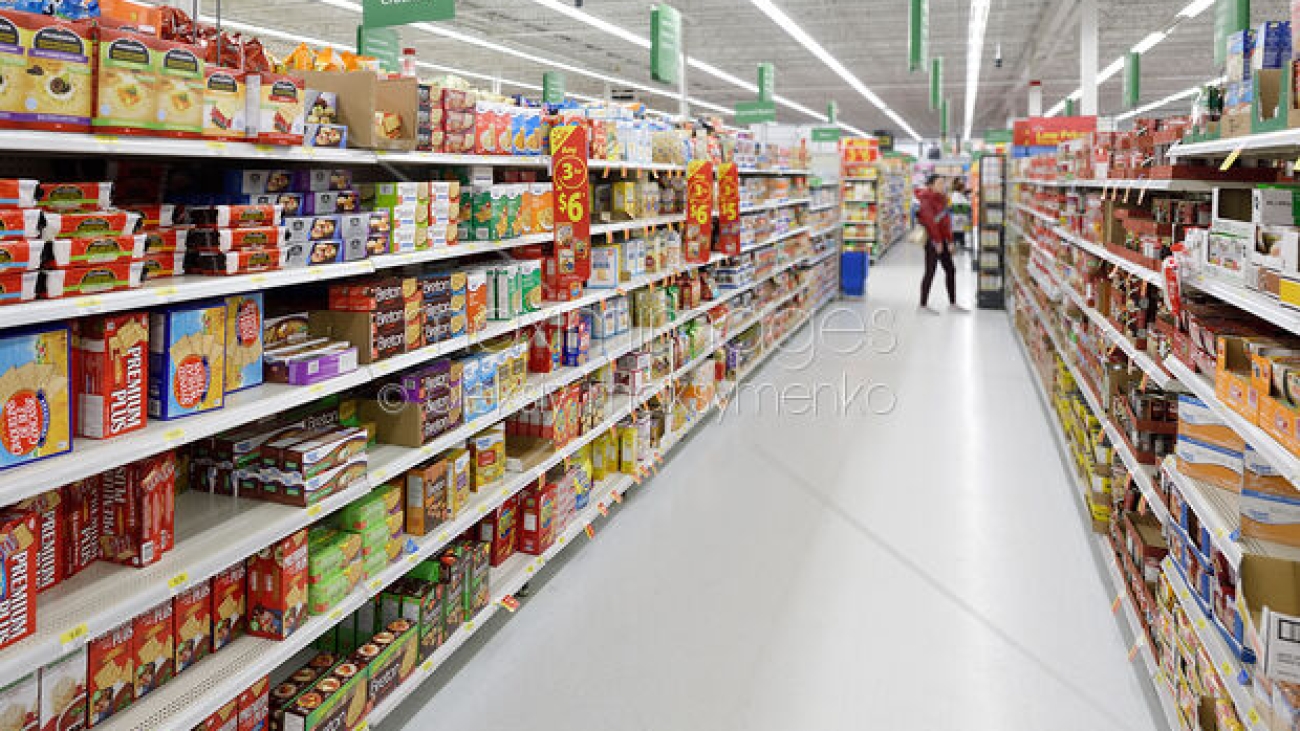 Groceries and canned food aisles at Walmart store food section. British Columbia, Canada 2017. License this image, buy commercial usage rights, or order photo prints at MaximImages.com